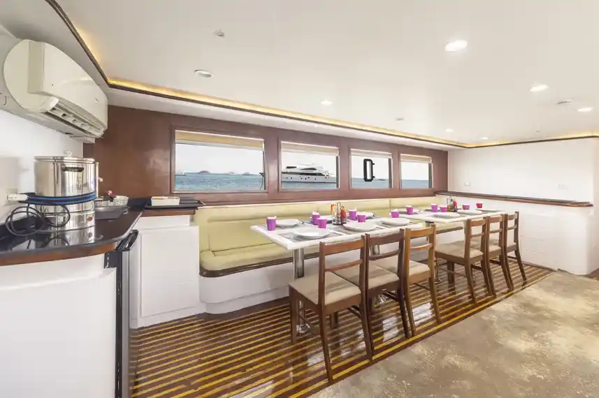 Interior of a well-lit cabin on the Sea Dragon yacht.